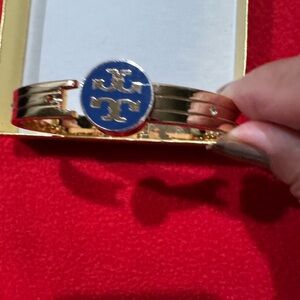 Tory Burch Gold-Tone Bangle with Blue Enamel Logo